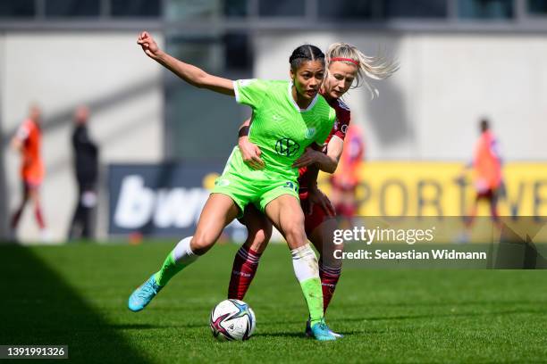 Sveindis Jane Jonsdottir of VfL Wolfsburg and Hanna Glas of FC Bayern München compete for the ball during the Women's DFB Cup semi final match...