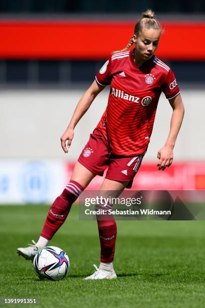 Giulia Gwinn of FC Bayern München plays the ball during the Women's DFB Cup semi final match between Bayern München and VfL Wolfsburg at FC Bayern...