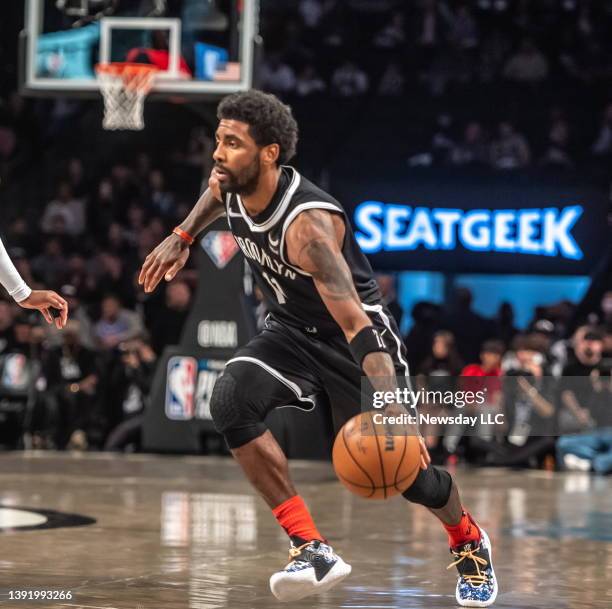 Brooklyn Nets' Kyrie Irving driving to the basket in the 1st quarter against the Cleveland Cavaliers at the Barclays Center in Brooklyn, New York on...