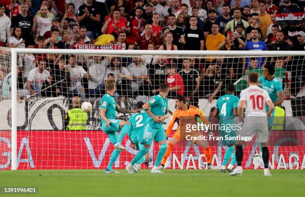 Ivan Rakitic of Sevilla FC scores their team's first goal during the LaLiga Santander match between Sevilla FC and Real Madrid CF at Estadio Ramon...