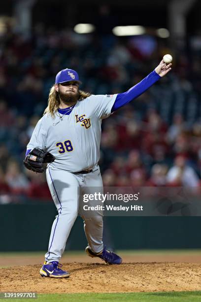 Riley Cooper of the LSU Tigers throws to first base during a game against the Arkansas Razorbacks at Baum-Walker Stadium at George Cole Field on...