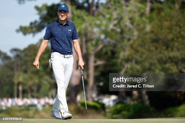 Jordan Spieth walks across the 17th green during the final round of the RBC Heritage at Harbor Town Golf Links on April 17, 2022 in Hilton Head...