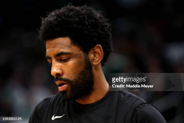 Kyrie Irving of the Brooklyn Nets looks on before Round 1 Game 1 of the 2022 NBA Eastern Conference Playoffs at TD Garden on April 17, 2022 in...