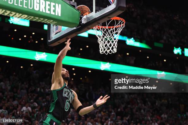 Jayson Tatum of the Boston Celtics scores the game winning basket against the Brooklyn Nets during the fourty quarter of Round 1 Game 1 of the 2022...