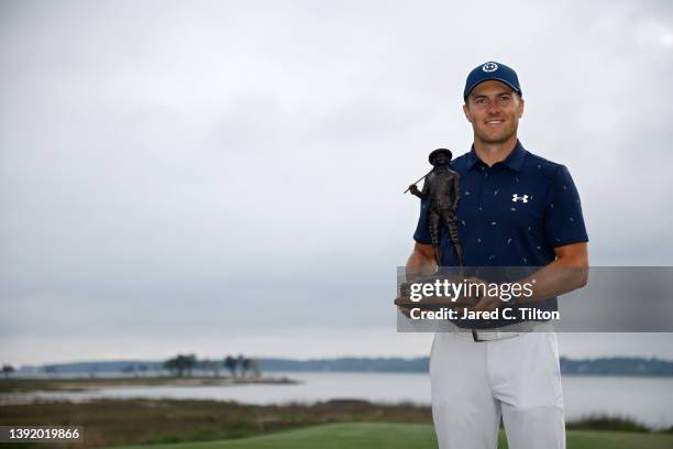 Jordan Spieth poses with the trophy after winning the RBC Heritage in a playoff at Harbor Town Golf Links on April 17, 2022 in Hilton Head Island,...