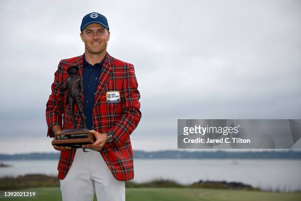 Jordan Spieth poses with the trophy after winning the RBC Heritage in a playoff at Harbor Town Golf Links on April 17, 2022 in Hilton Head Island,...