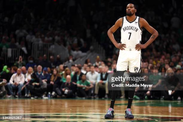 Kevin Durant of the Brooklyn Nets looks on during the first quarter of Round 1 Game 1 of the 2022 NBA Eastern Conference Playoffs against the Boston...