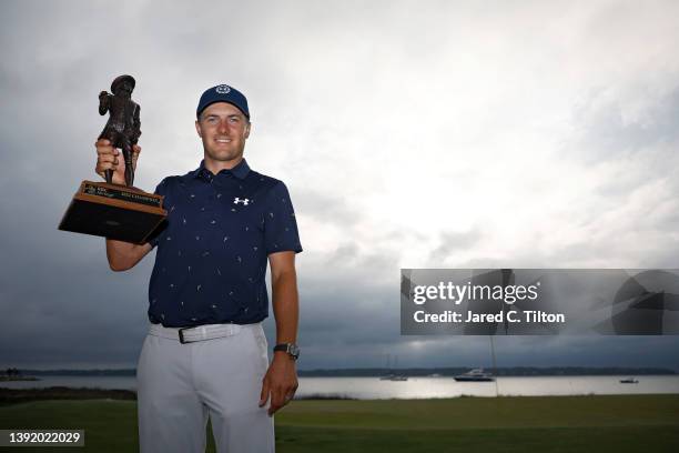 Jordan Spieth poses with the trophy after winning the RBC Heritage in a playoff at Harbor Town Golf Links on April 17, 2022 in Hilton Head Island,...