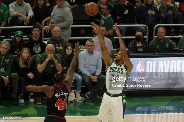 Giannis Antetokounmpo of the Milwaukee Bucks takes a three point shot over Patrick Williams of the Chicago Bulls during the first quarter of Game One...