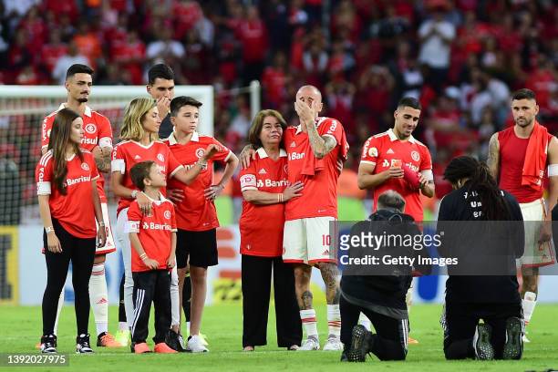 Andrés D'Alessandro of Internacional cries next to his family during his retirement ceremony after a match between Internacional and Fortaleza as...