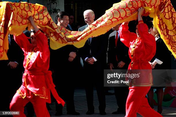 Vice President Joe Biden and Chinese Vice President Xi Jinping watch a dance performance during a visit to International Studies Learning Center...