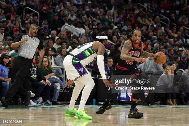 DeMar DeRozan of the Chicago Bulls is defended by Wesley Matthews of the Milwaukee Bucks during the second quarter of Game One of the Eastern...