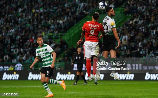 Goncalo Inacio of Sporting CP with Darwin Nunez of SL Benfica in action during the Liga Bwin match between Sporting CP and SL Benfica at Estadio Jose...