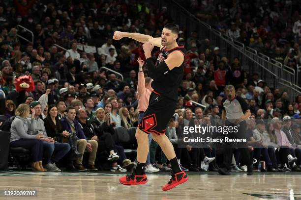 Nikola Vucevic of the Chicago Bulls reacts to a three point shot against the Milwaukee Bucks during the second half of Game One of the Eastern...