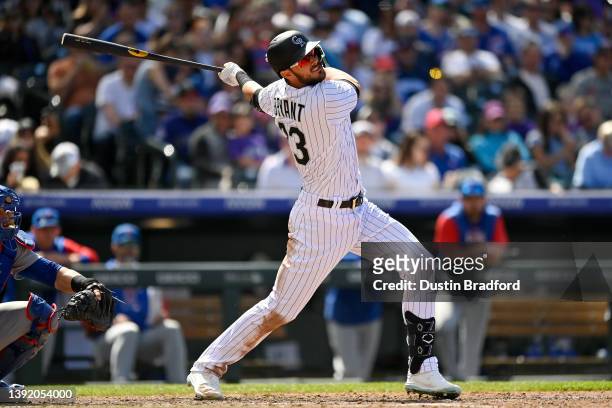 Kris Bryant of the Colorado Rockies hits a sixth inning double against the Chicago Cubs at Coors Field on April 17, 2022 in Denver, Colorado.