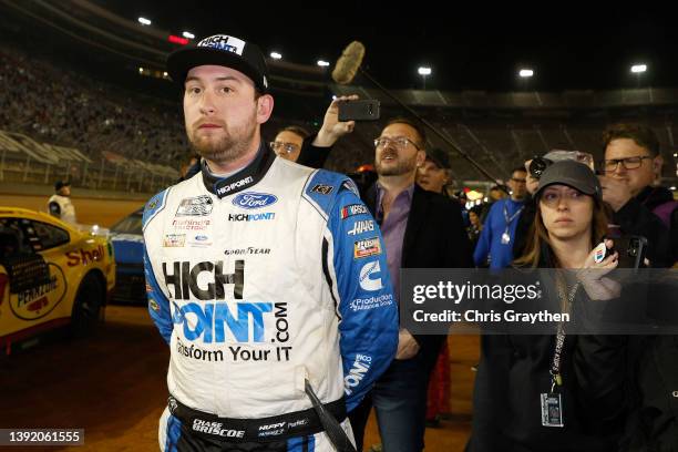 Chase Briscoe, driver of the HighPoint.com Ford ,waits on the grid after the NASCAR Cup Series Food City Dirt Race at Bristol Motor Speedway on April...