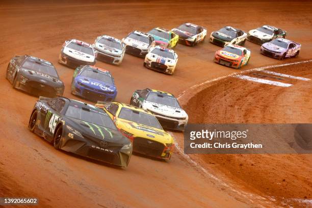 Kurt Busch, driver of the Monster Energy Toyota, Michael McDowell, driver of the Love's Travel Stops Ford, and Justin Haley, driver of the LeafFilter...