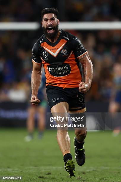 James Tamou of the Tigers celebrates winning the round six NRL match between the Parramatta Eels and the Wests Tigers at CommBank Stadium on April 18...