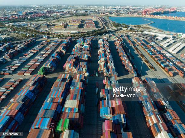 An aerial view of shipping containers sitting stacked at the Port of Los Angeles on April 15, 2022 in San Pedro, California.