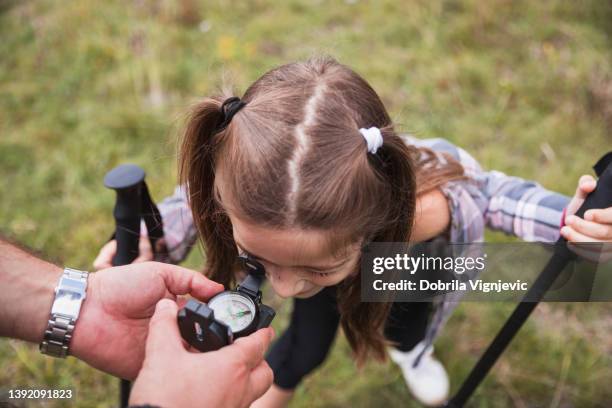 Children Using Compass Child Holding Compass Photos and Premium High Res Pictures - Getty Images