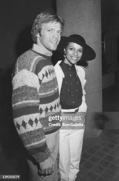 Actress Debbie Allen and actor Morgan Stevens attending "Grand Opening of Santopietro's Restaurant" on January 21, 1983 in Calabasas, California.