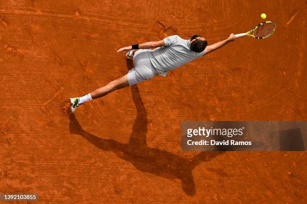 Benoit Paire of France plays a forehand against Soonwoo Kwon of South Korea during day 1 of the ATP500 Barcelona Open Banc Sabadell at Real Club De...
