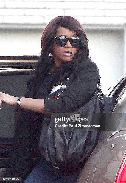 Bobbi Kristina Houston Brown arrives at Whigham Funeral Home for a private viewing for her mother Whitney Houston on February 17, 2012 in Newark, New...
