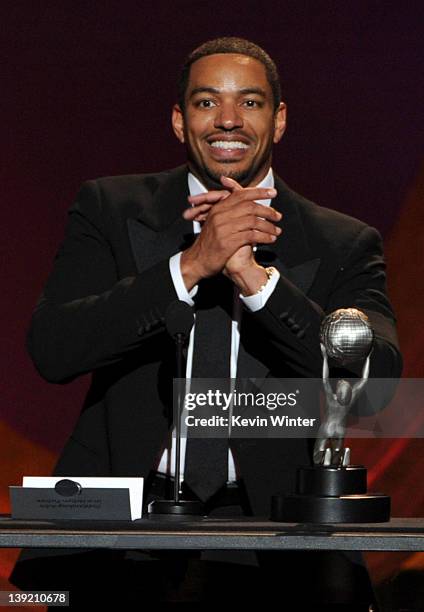 Actor Laz Alonzo accepts the award for Outstanding Actor in a Motion Picture for "Jumping the Broom" onstage at the 43rd NAACP Image Awards held at...