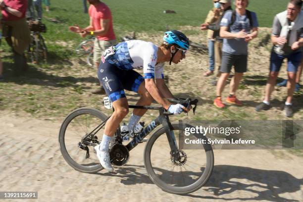 Jenthe Biermans of Belgium and Team Israel - Premier Tech competes in "Pont-Thibault" cobblestones sector of 119th Paris-Roubaix 2022 - Men's Elite...