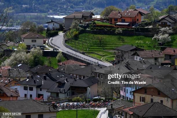 General view of the peloton passing through a village landscape during the 45th Tour of the Alps 2022 - Stage 1 a 160,9km stage from Cles to...