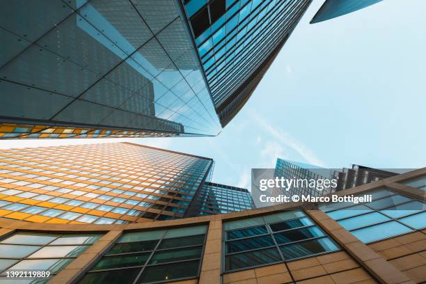 low angle view of modern skyscrapers, frankfurt, germany - frankfurt germany stock pictures, royalty-free photos & images