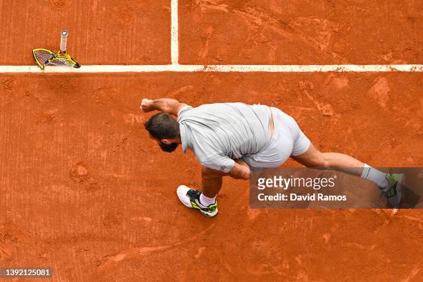 Benoit Paire of France smashes his racket after losing the first set against Soonwoo Kwon of South Korea during day 1 of the ATP500 Barcelona Open...