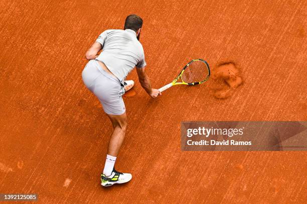 Benoit Paire of France smashes his racket after losing the first set against Soonwoo Kwon of South Korea during day 1 of the ATP500 Barcelona Open...