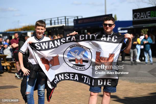 Swansea City fans pose for a photo outside the stadium prior to the Sky Bet Championship match between Reading and Swansea City at Select Car Leasing...