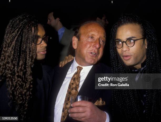 Musicians Rob Pilatus and Fab Morvan of Milli Vanilli and Clive Davis attend Arista Records Pre-Grammy Awards Party on February 20, 1990 at the...