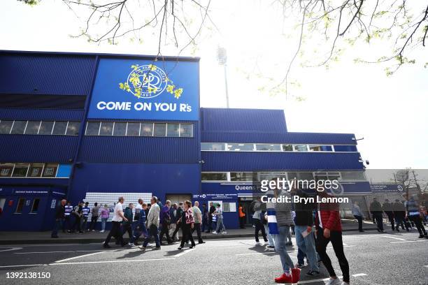 Fans arrive at the stadium prior to the Sky Bet Championship match between Queens Park Rangers and Derby County at The Kiyan Prince Foundation...