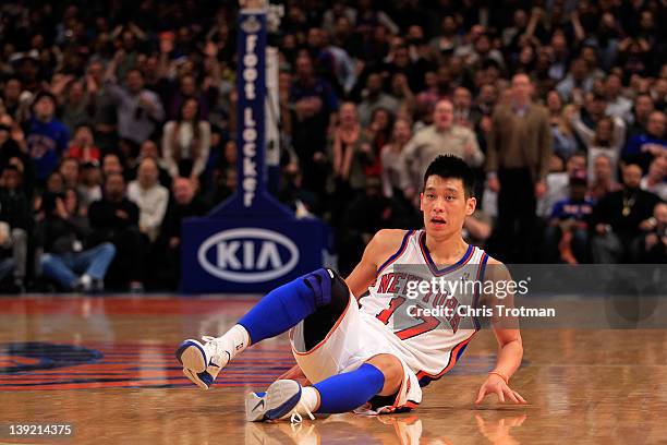 Jeremy Lin of the New York Knicks falls to the court against the New Orleans Hornets at Madison Square Garden on February 17, 2012 in New York City....