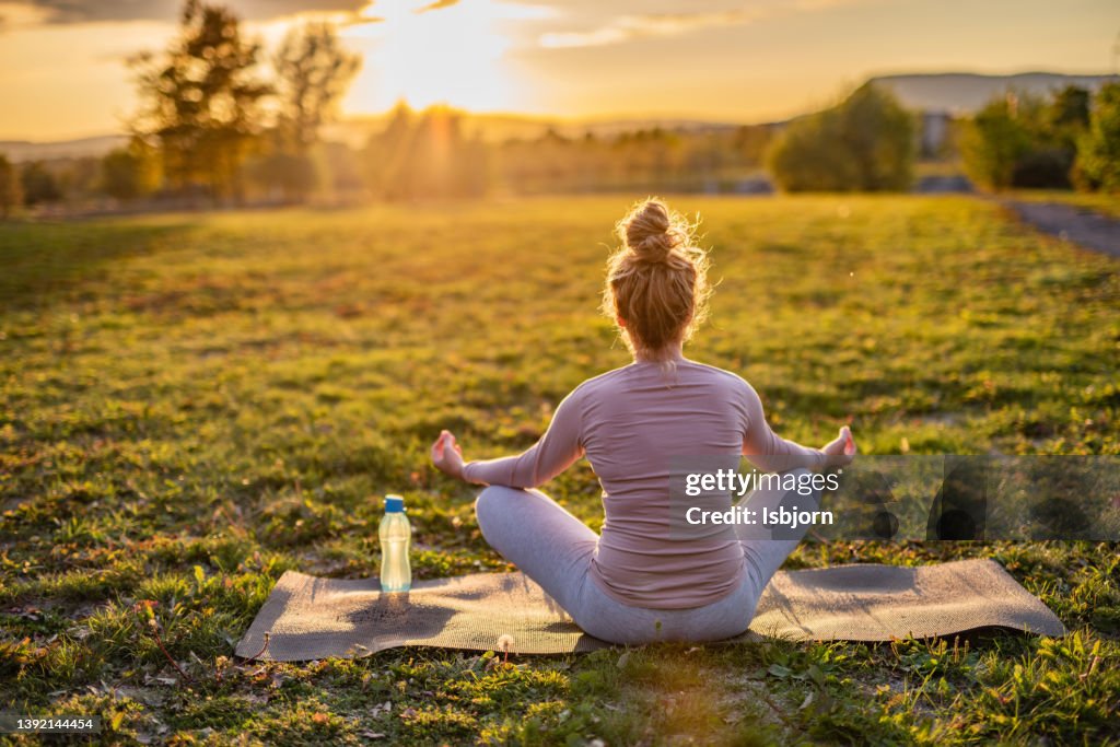 Woman meditating in nature