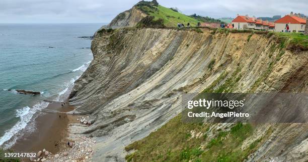 flysch off the coast of zumaia - valley side stock-fotos und bilder