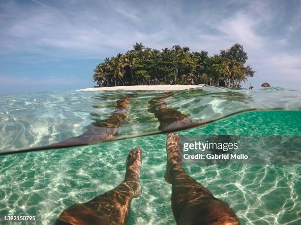 pov of man legs underwater at guyam island - pov or personal perspective or immersion stock pictures, royalty-free photos & images