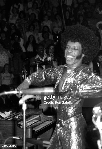 Musician Sly Stone performs at Sly Stone-Kathy Silva Wedding Concert on June 5, 1974 at Madison Square Garden in New York City.