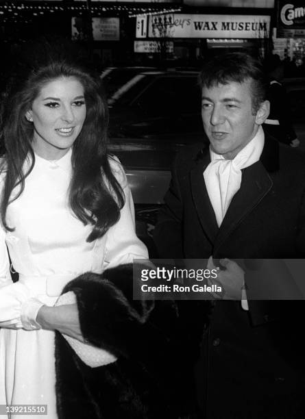 Singer Bobby and Bobby Gentry attend the premiere of "Dr. Dolittle" on December 16, 1967 at Loew's State Theater in New York City.