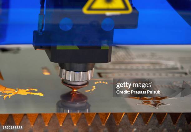 cnc laser cutting of metal close up, modern industrial technology - robotic car stock pictures, royalty-free photos & images