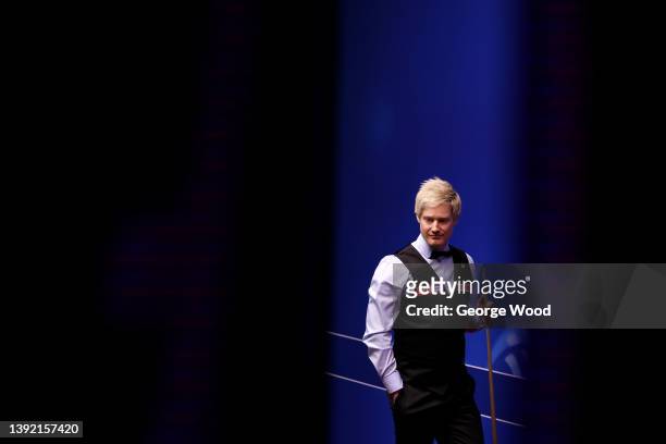 Neil Robertson of Australia looks on during the Betfred World Snooker Championship Round One match between Neil Robertson of Australia and Ashley...