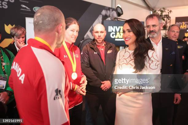 Meghan, Duchess of Sussex chats with members of the Canadian Invictus Team at the IGF Reception during day two of the Invictus Games The Hague 2020...