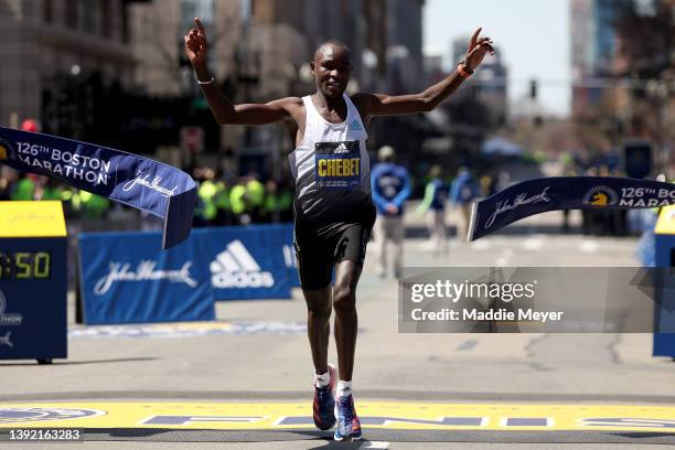 Evans Chebet of Kenya crosses the finish line to take first place in the professional men's division during the 126th Boston Marathon on April 18,...