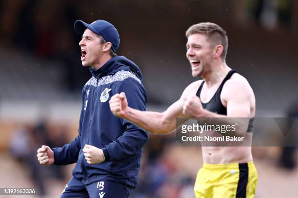 Joey Barton, Manager of Bristol Rovers, and Sam Finley celebrates their side's win after the final whistle of the Sky Bet League Two match between...