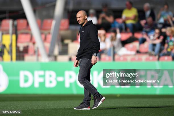 Sofian Chahed, Head Coach of 1. FFC Turbine Potsdam inspects the pitch prior to the Women's DFB Cup semi final match between Bayer 04 Leverkusen and...