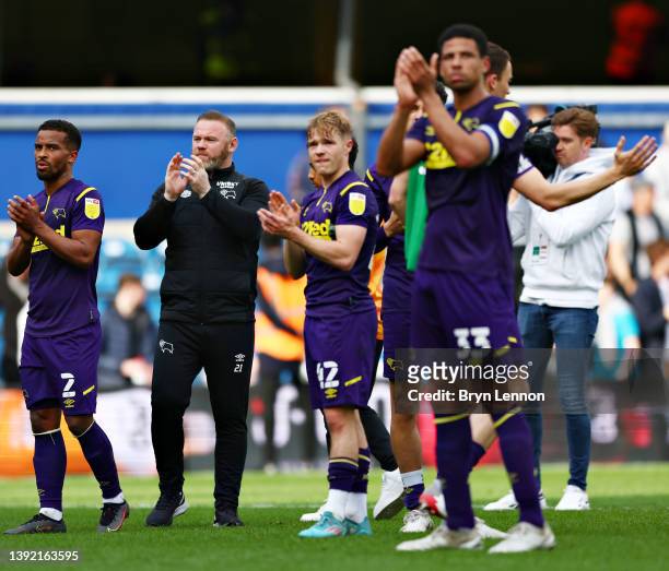 Nathan Byrne, Wayne Rooney, Manager of Derby County, Liam Thompson of Derby County applauds their fans after the final whistle of the Sky Bet...