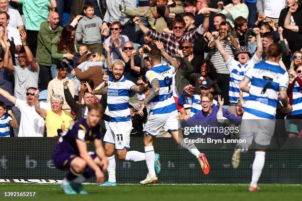 Charlie Austin of Queens Park Rangers celebrates after scoring a goal with teammate Lyndon Dykes which is later disallowed for offside during the Sky...